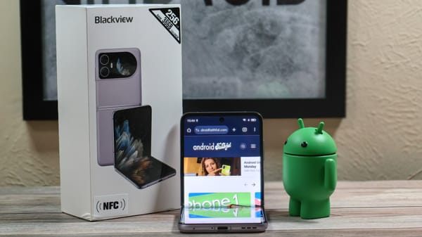 The Blackview Hero 10 next to its box and an Android figurine.
